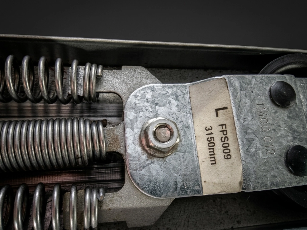 Novoferm horizontale trekveer met metalen rolhouder